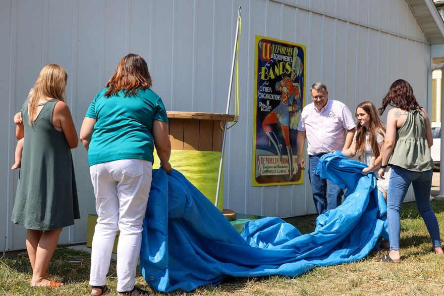 New outdoor display, Tools of the Seamstress, in memory of DeMoulin employees Frances Ulmer and Patsy Koonce.